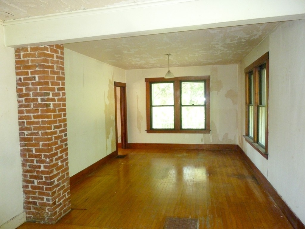 16 Jones Road Pelham, MA 01002 - Photo 4 of 15 a view of an empty room and window