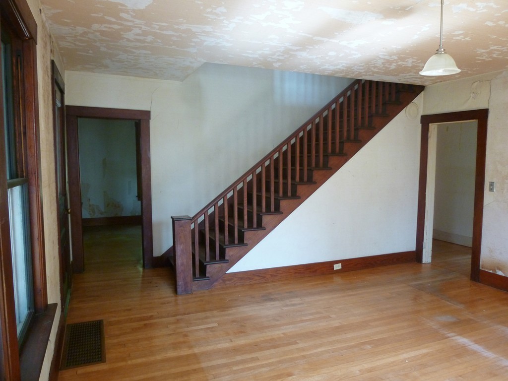 16 Jones Road Pelham, MA 01002 - Photo 5 of 15 a view of a hallway with an entryway and wooden floor