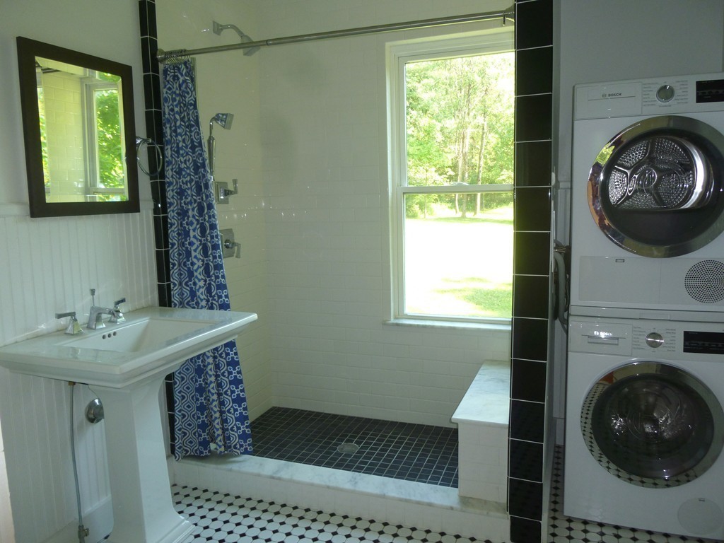 16 Jones Road Pelham, MA 01002 - Photo 8 of 15 a bathroom with a sink a toilet and a window
