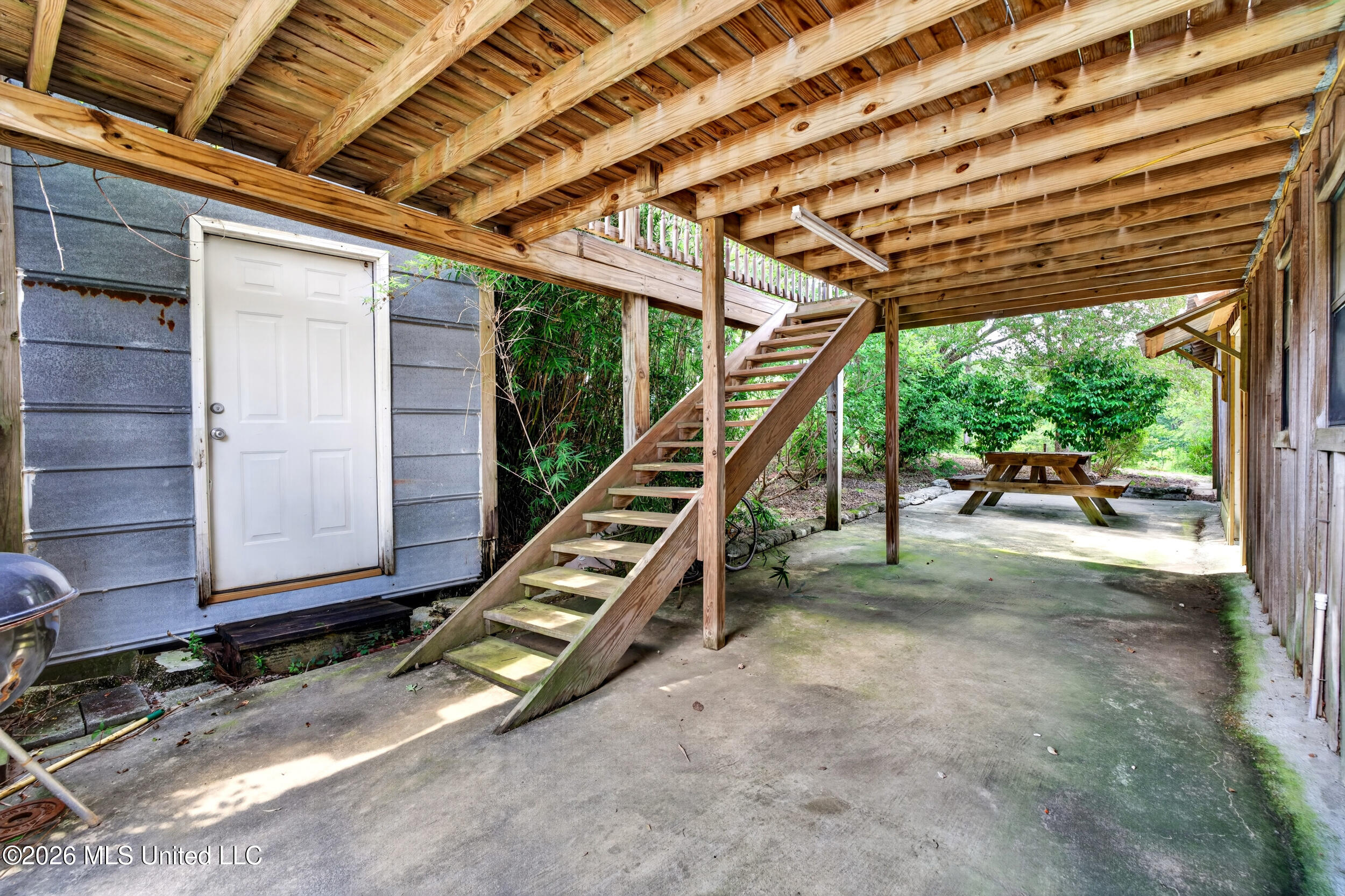 574 Slade Woodward Road Poplarville, MS 39470 - Photo 54 of 106 54_sideporch_stairs