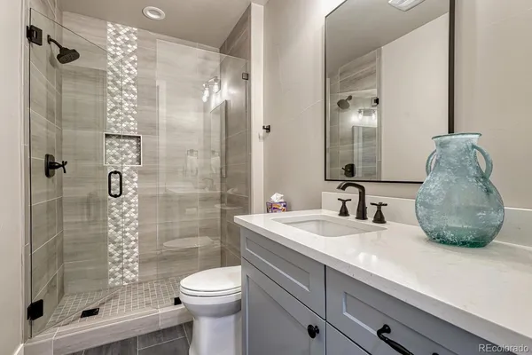 a view of a balcony with furniture