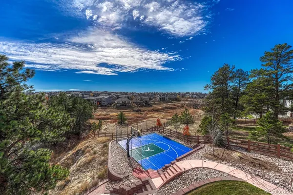 a view of a house with a yard and sitting space