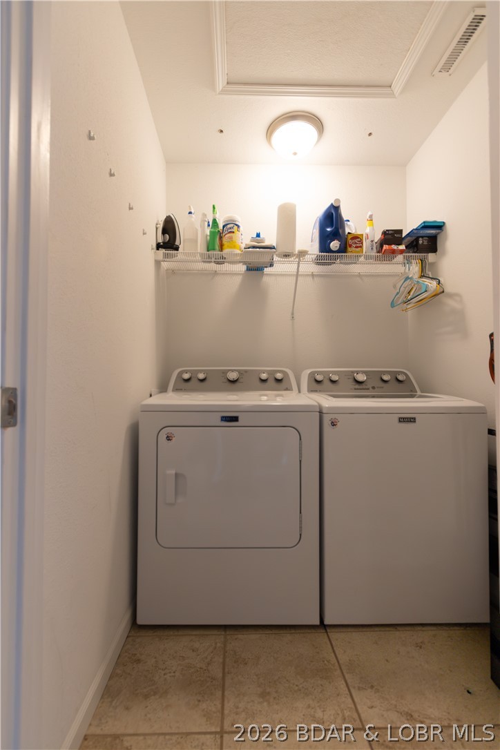 1106 Red Bud Road Osage Beach, MO 65065 - Photo 23 of 31 .... washer and dryer in laundry room