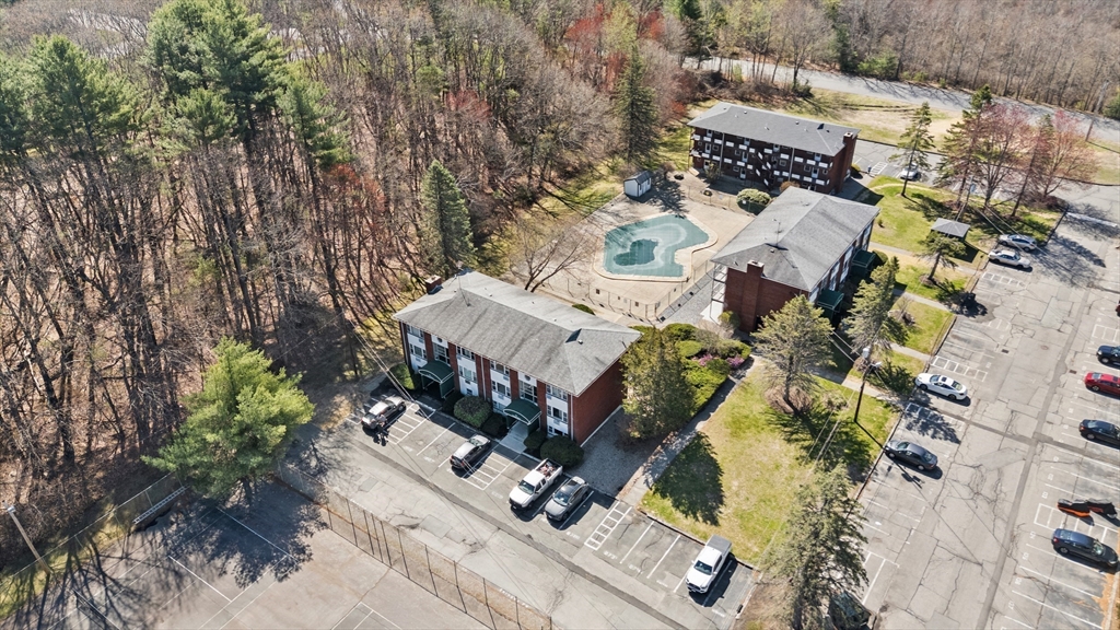 2 Colonial Drive, Unit E25 Andover, MA 01810 - Photo 17 of 17 an aerial view of a house with outdoor space