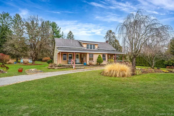 a front view of house with yard