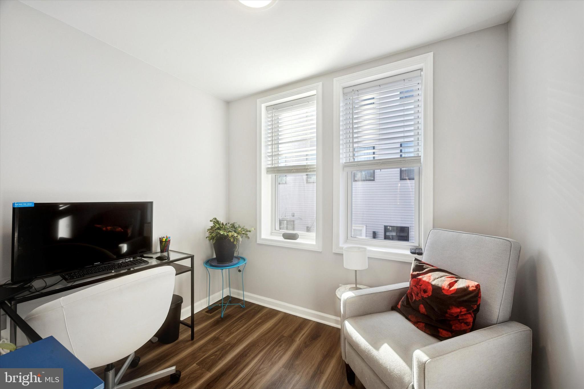 720 Tree Street Philadelphia, PA 19148 - Photo 14 of 26 a living room with furniture and a flat screen tv