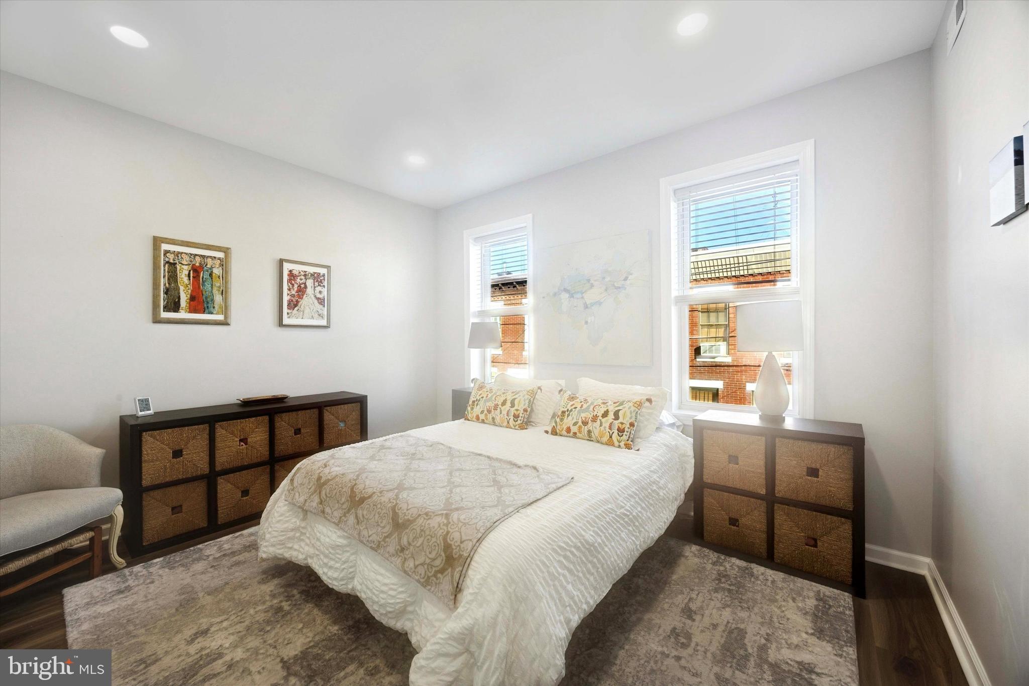 720 Tree Street Philadelphia, PA 19148 - Photo 22 of 26 a bedroom with a bed and a window