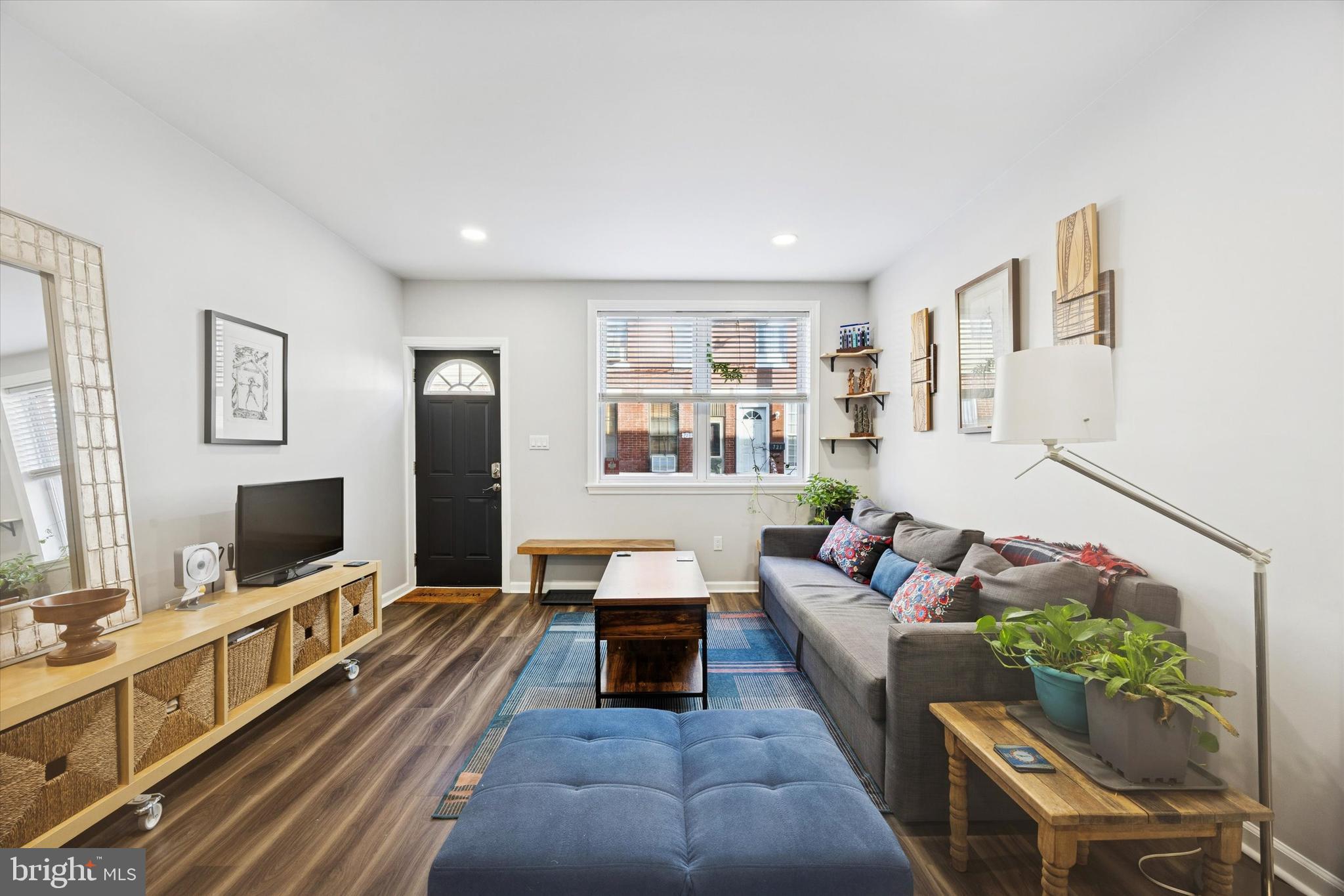 720 Tree Street Philadelphia, PA 19148 - Photo 5 of 26 a living room with furniture and a flat screen tv