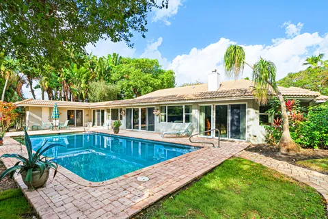 $995,000 | 416 South Country Club Drive, Atlantis, FL 33462