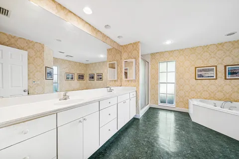 $995,000 | 416 South Country Club Drive, Atlantis, FL 33462