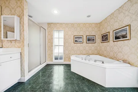 $995,000 | 416 South Country Club Drive, Atlantis, FL 33462