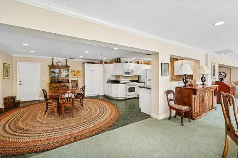 $995,000 | 416 South Country Club Drive, Atlantis, FL 33462