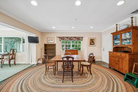 $995,000 | 416 South Country Club Drive, Atlantis, FL 33462