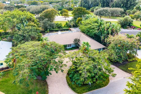 $995,000 | 416 South Country Club Drive, Atlantis, FL 33462