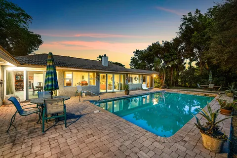 $995,000 | 416 South Country Club Drive, Atlantis, FL 33462