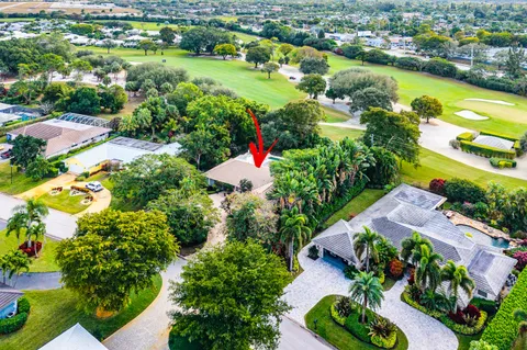 $995,000 | 416 South Country Club Drive, Atlantis, FL 33462
