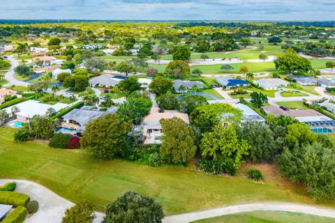 $995,000 | 416 South Country Club Drive, Atlantis, FL 33462