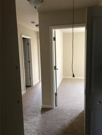 a view of a room with a wardrobe space