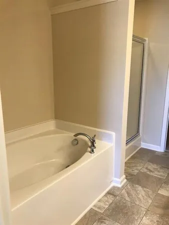 a bathroom with a bathtub