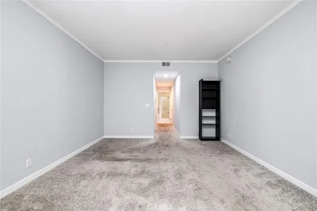 a bathroom with a tub a sink and a mirror