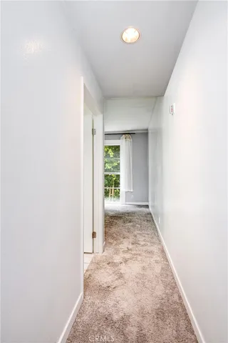 a view of room with a large window