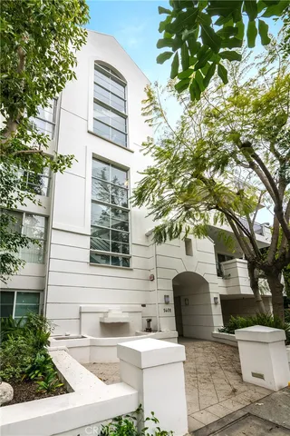 a view of house with yard