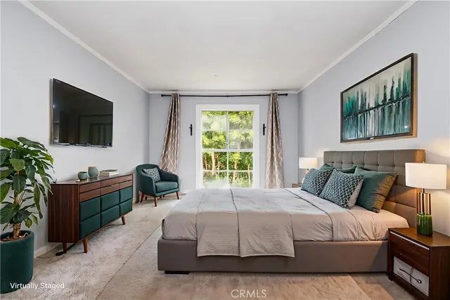 a view of a big room with windows and bed