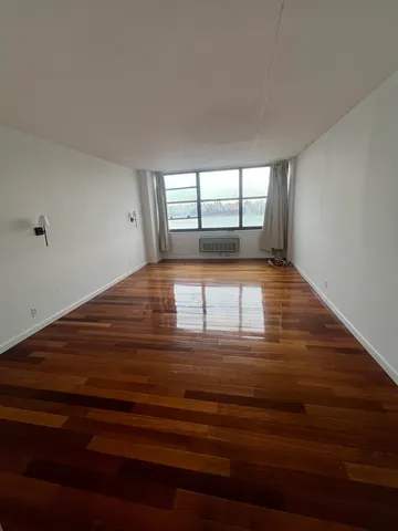 a view of an empty room and window