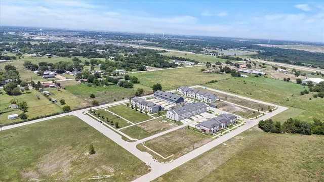an aerial view of a pool table and chairs