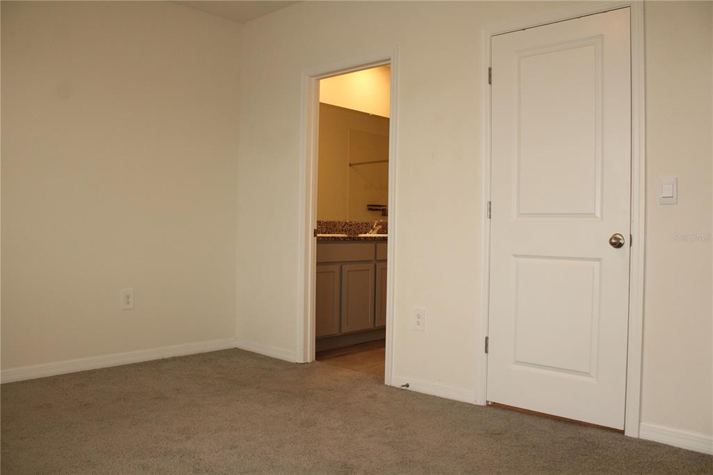 17567 Crescent Moon Loop Bradenton, FL 34211 - Photo 20 of 51 a view of an empty room