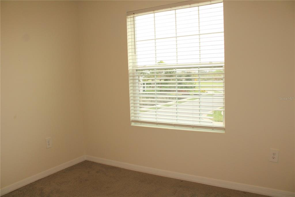 17567 Crescent Moon Loop Bradenton, FL 34211 - Photo 32 of 51 an empty room with a window