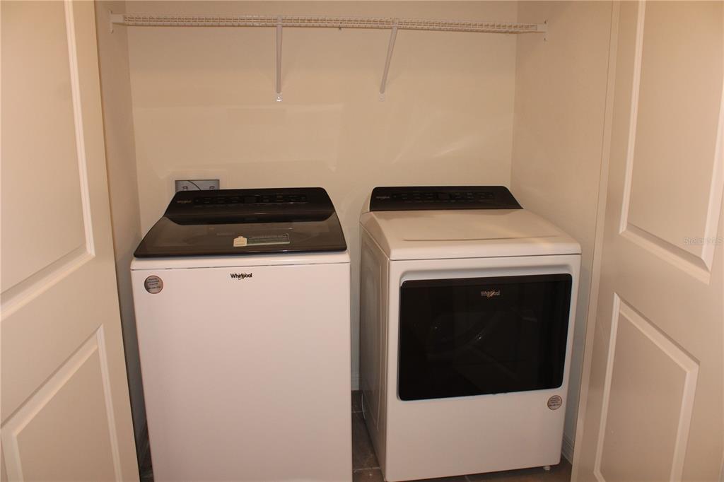 17567 Crescent Moon Loop Bradenton, FL 34211 - Photo 35 of 51 a utility room with dryer and washer