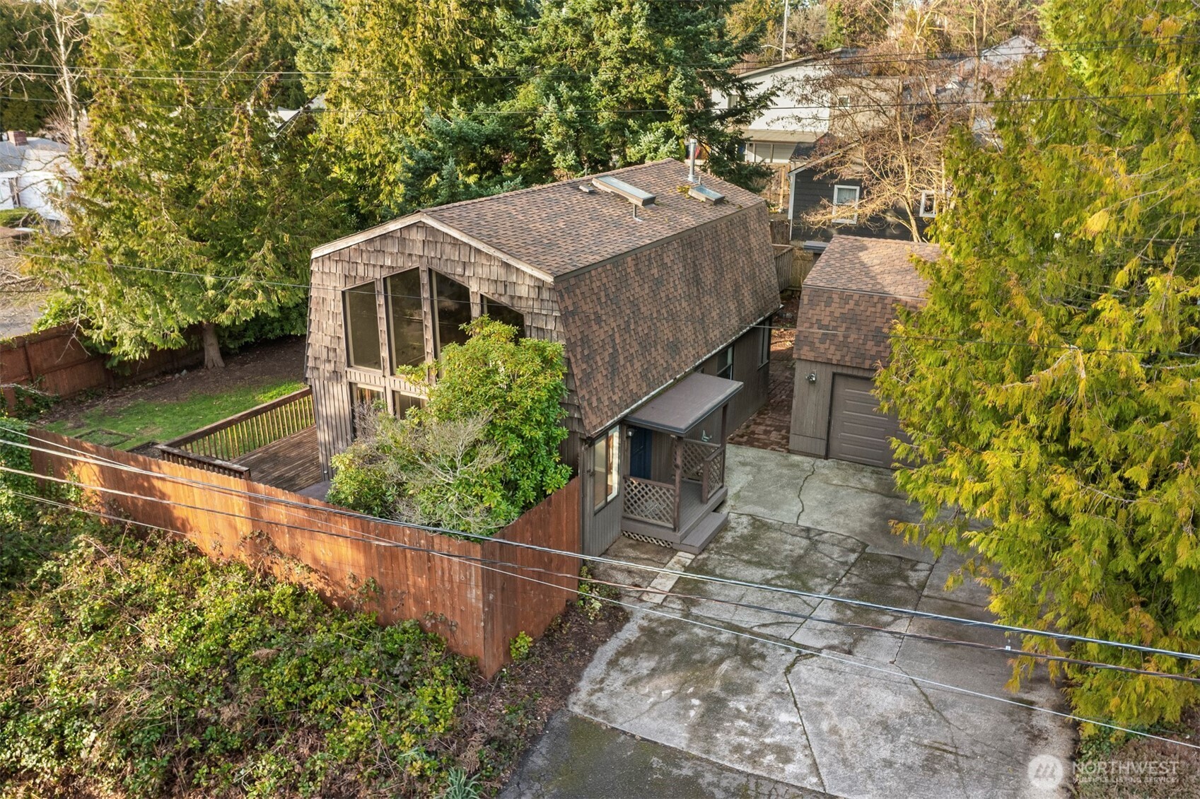 a aerial view of a house with a yard