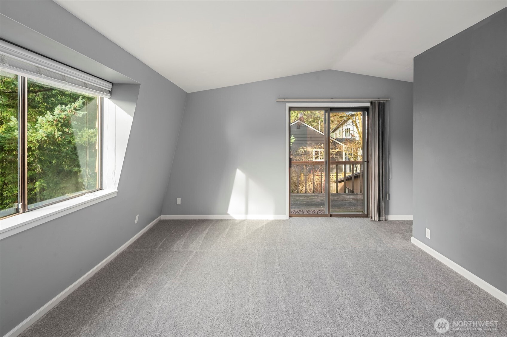 1504 Northeast 107th Street Seattle, WA 98125 - Photo 13 of 35 a view of an empty room with a window