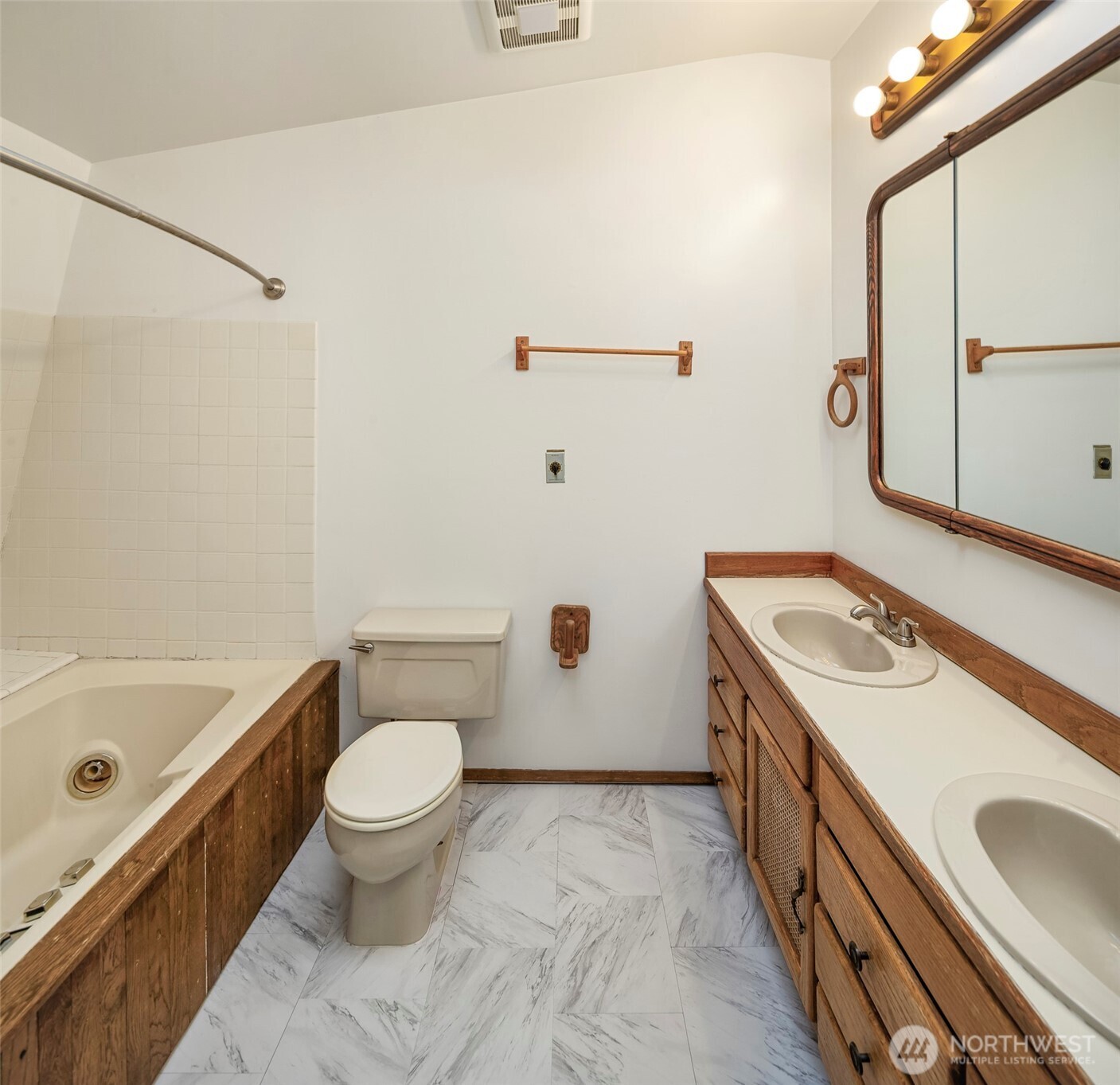 1504 Northeast 107th Street Seattle, WA 98125 - Photo 15 of 35 a bathroom with a sink toilet and shower