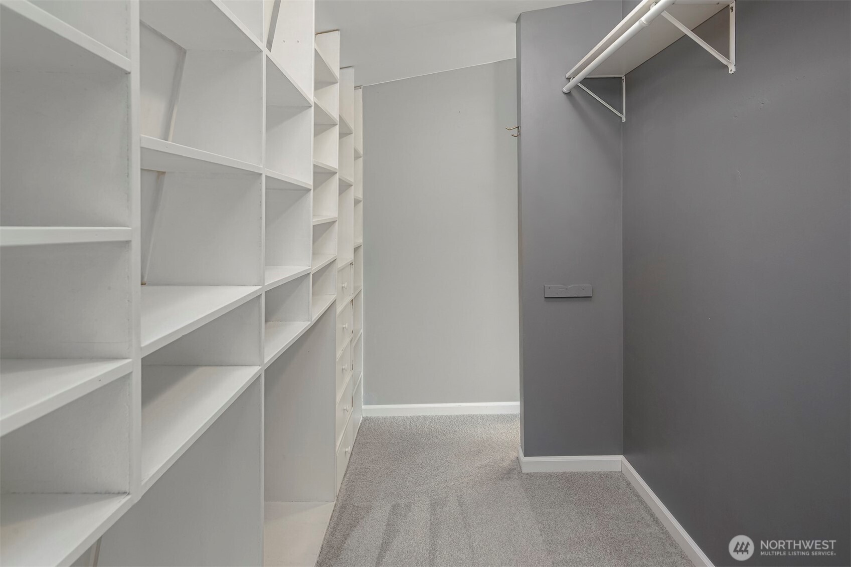 1504 Northeast 107th Street Seattle, WA 98125 - Photo 16 of 35 a view of walk in closet with empty racks
