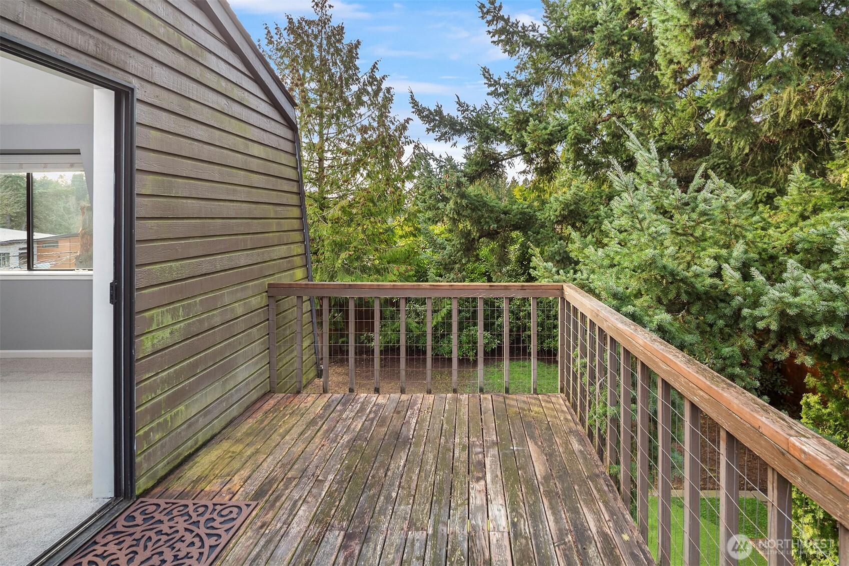 1504 Northeast 107th Street Seattle, WA 98125 - Photo 17 of 35 a view of balcony with wooden floor
