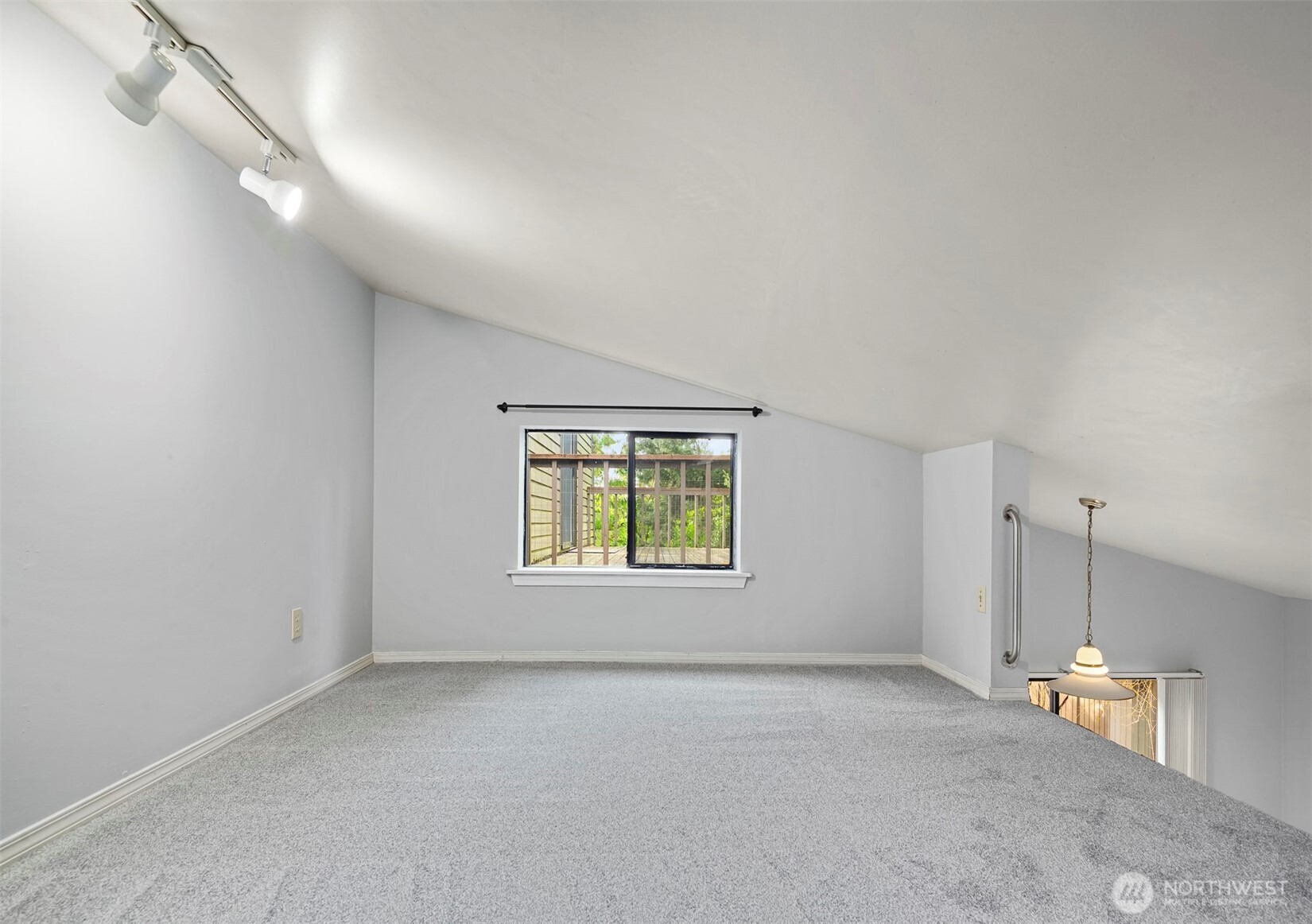 1504 Northeast 107th Street Seattle, WA 98125 - Photo 25 of 35 an empty room with a empty space and windows