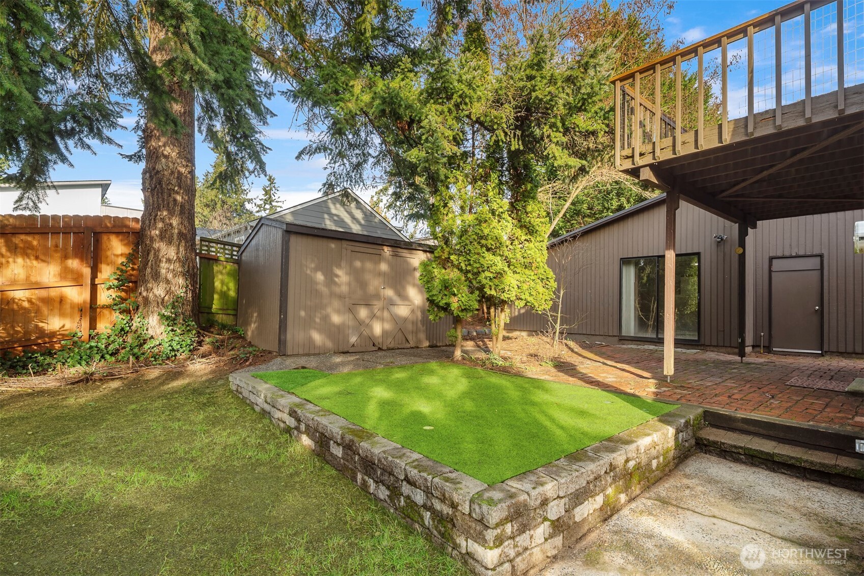 1504 Northeast 107th Street Seattle, WA 98125 - Photo 35 of 35 a view of a house with backyard and sitting area