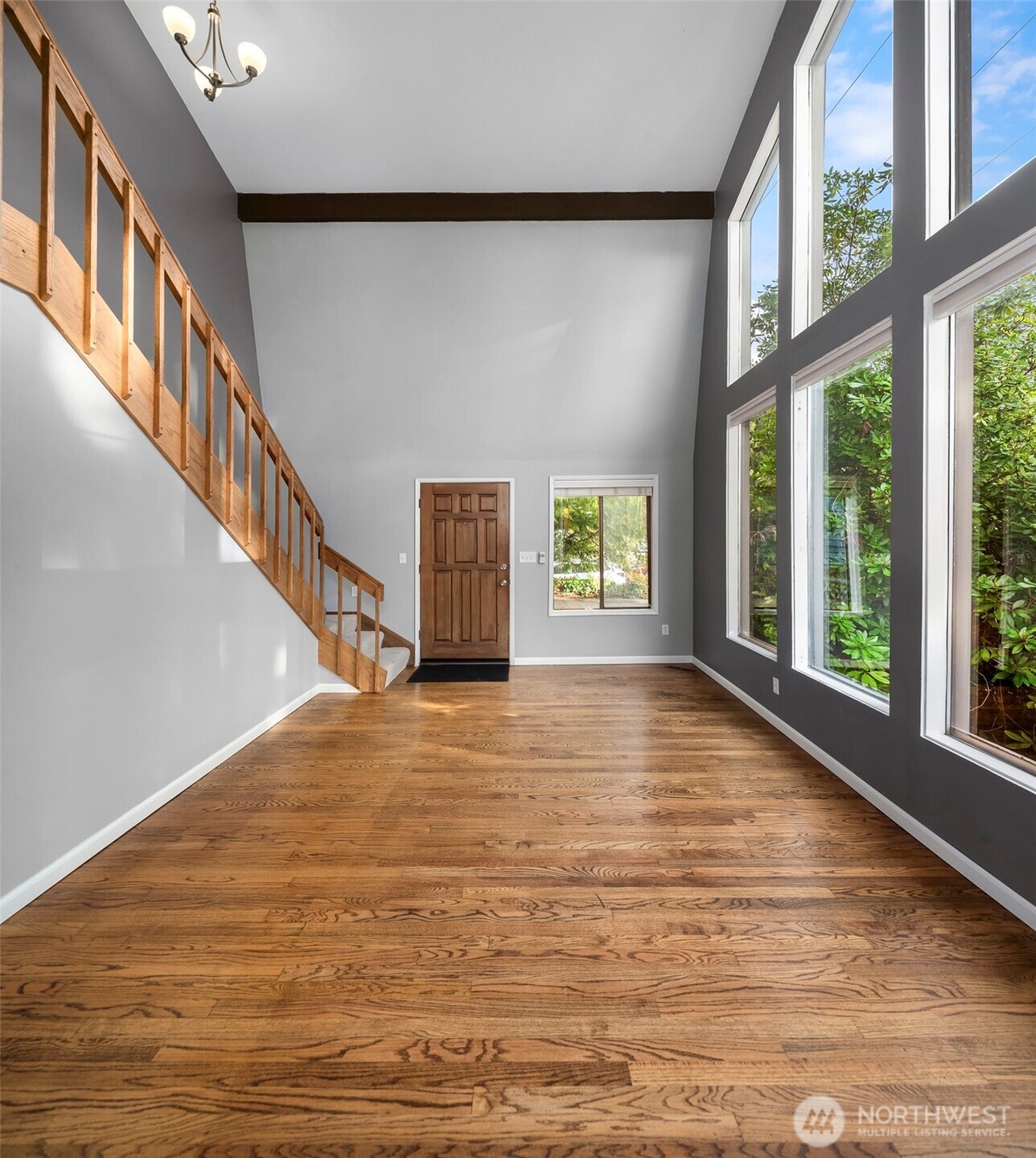1504 Northeast 107th Street Seattle, WA 98125 - Photo 7 of 35 a view of an entryway with wooden floor