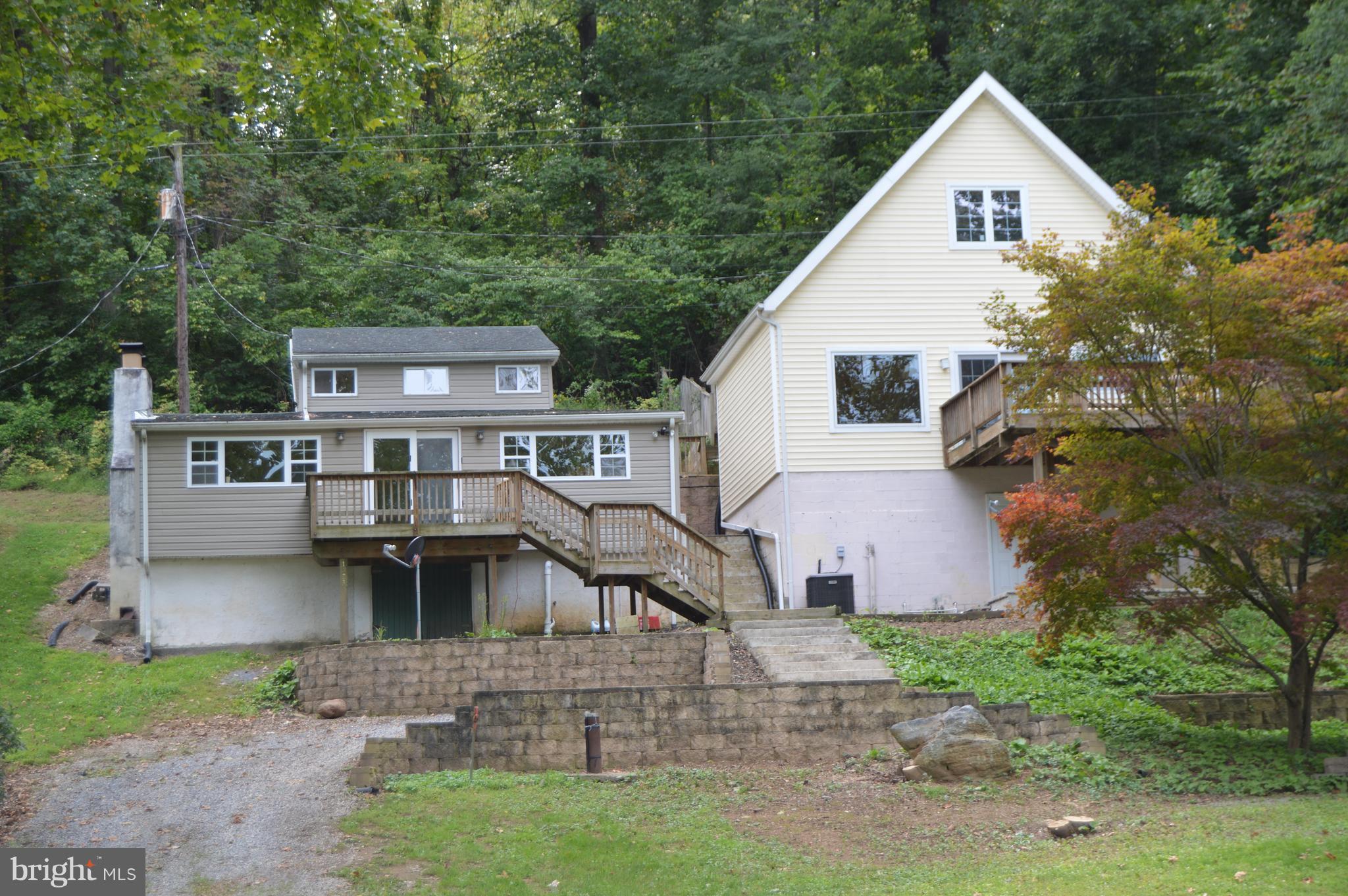 1529 Knott Road Shepherdstown, WV 25443 - Photo 2 of 20 front view of a house with a yard