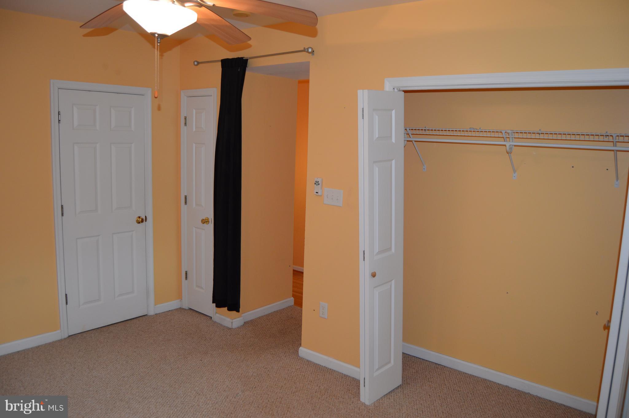 1529 Knott Road Shepherdstown, WV 25443 - Photo 11 of 20 a view of closet with wooden floor