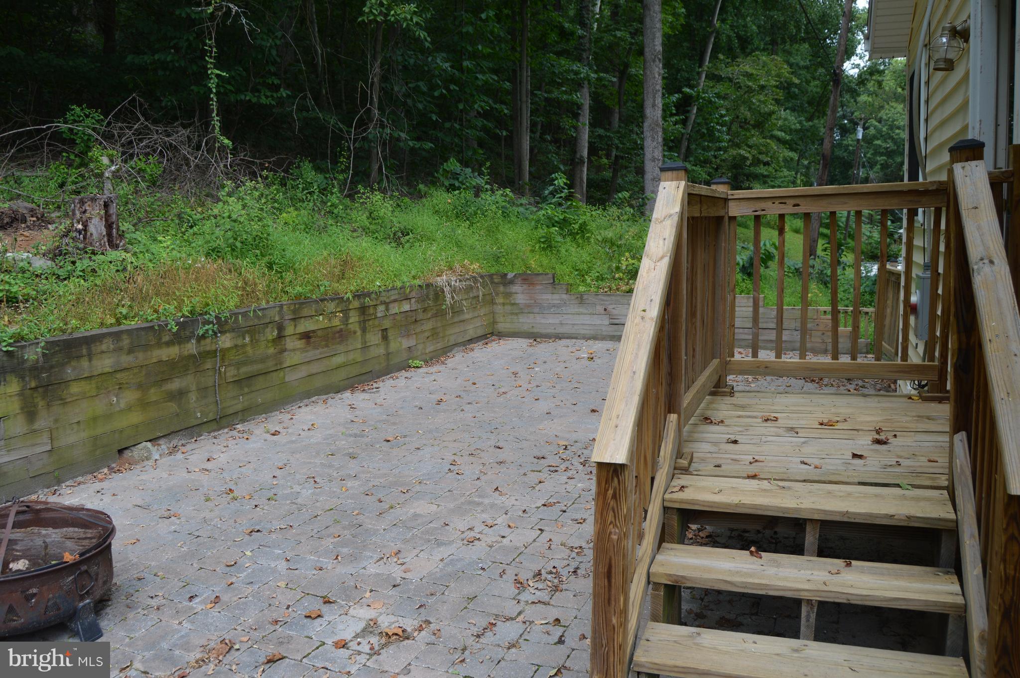 1529 Knott Road Shepherdstown, WV 25443 - Photo 15 of 20 a view of a wooden deck and a lake view