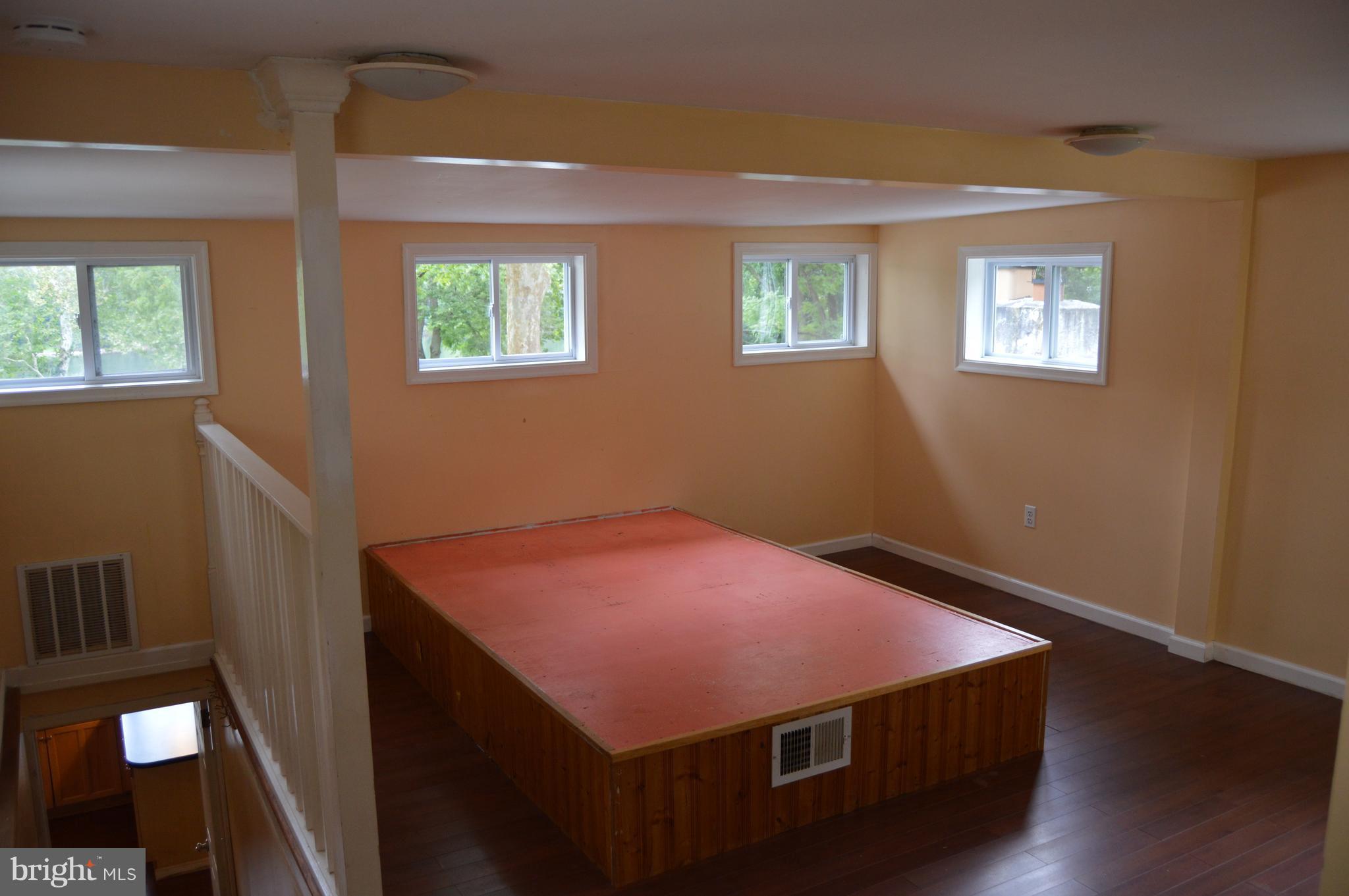 1529 Knott Road Shepherdstown, WV 25443 - Photo 19 of 20 a bed room with a bed and a window
