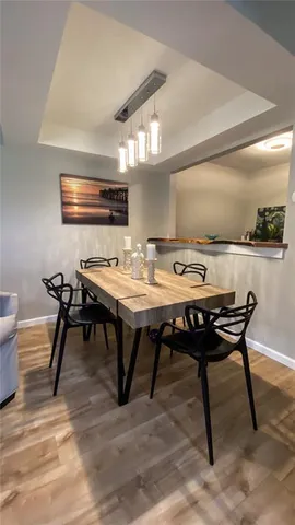 a kitchen with stainless steel appliances granite countertop a refrigerator sink and cabinets