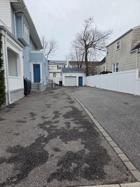 67 East Fulton Street Long Beach, NY 11561 - Photo 2 of 3 a view of a house with a backyard