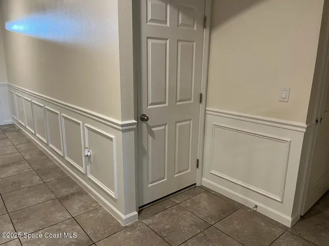 a view of a hallway with entryway