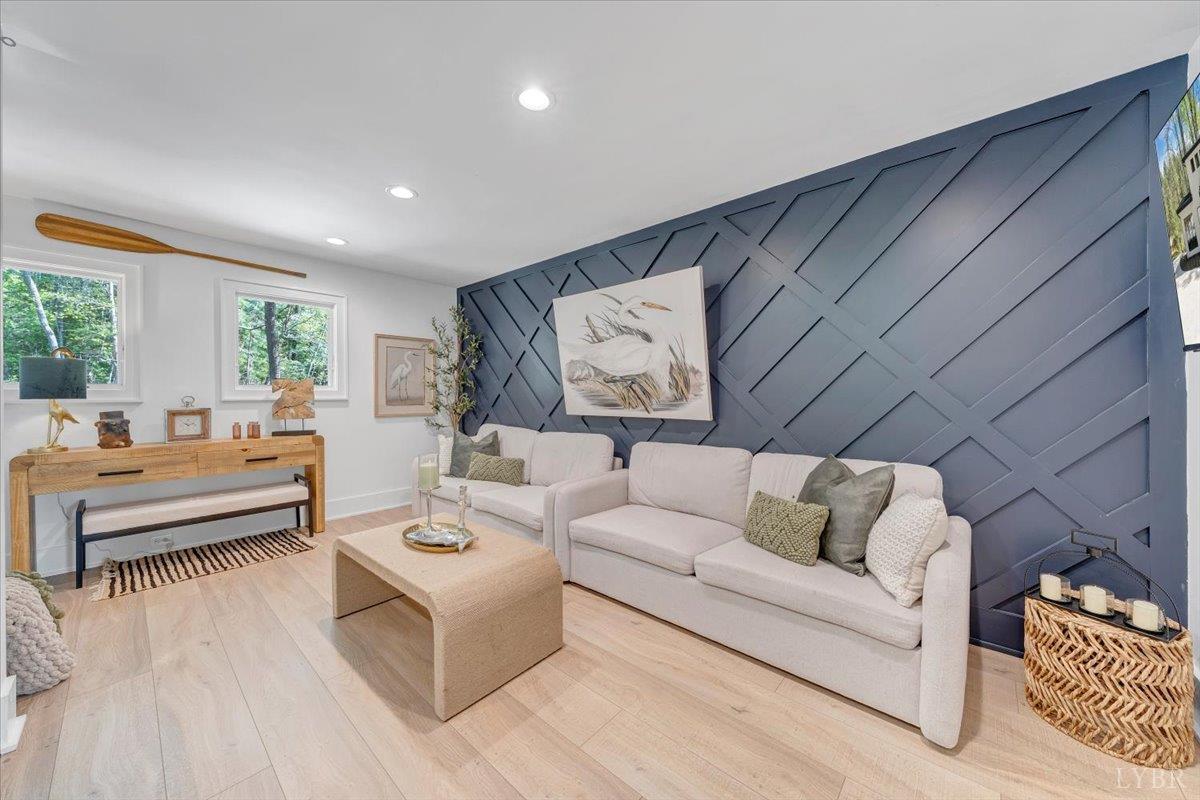 16358 Moneta Road Moneta, VA 24121 - Photo 37 of 78 Enter the upper level loft/living room, full bath and 2 additional bedrooms each with access to the upper covered deck overlooking the lake!