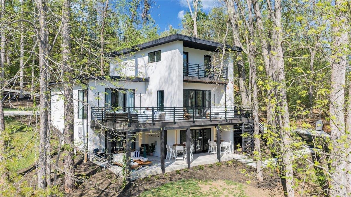 16358 Moneta Road Moneta, VA 24121 - Photo 4 of 78 Connected to county sewer—eliminating guest limitations often associated with septic systems—this property offers added convenience and flexibility. Optimized for short-term rental success, the property offers accommodations for up to 22 guest!