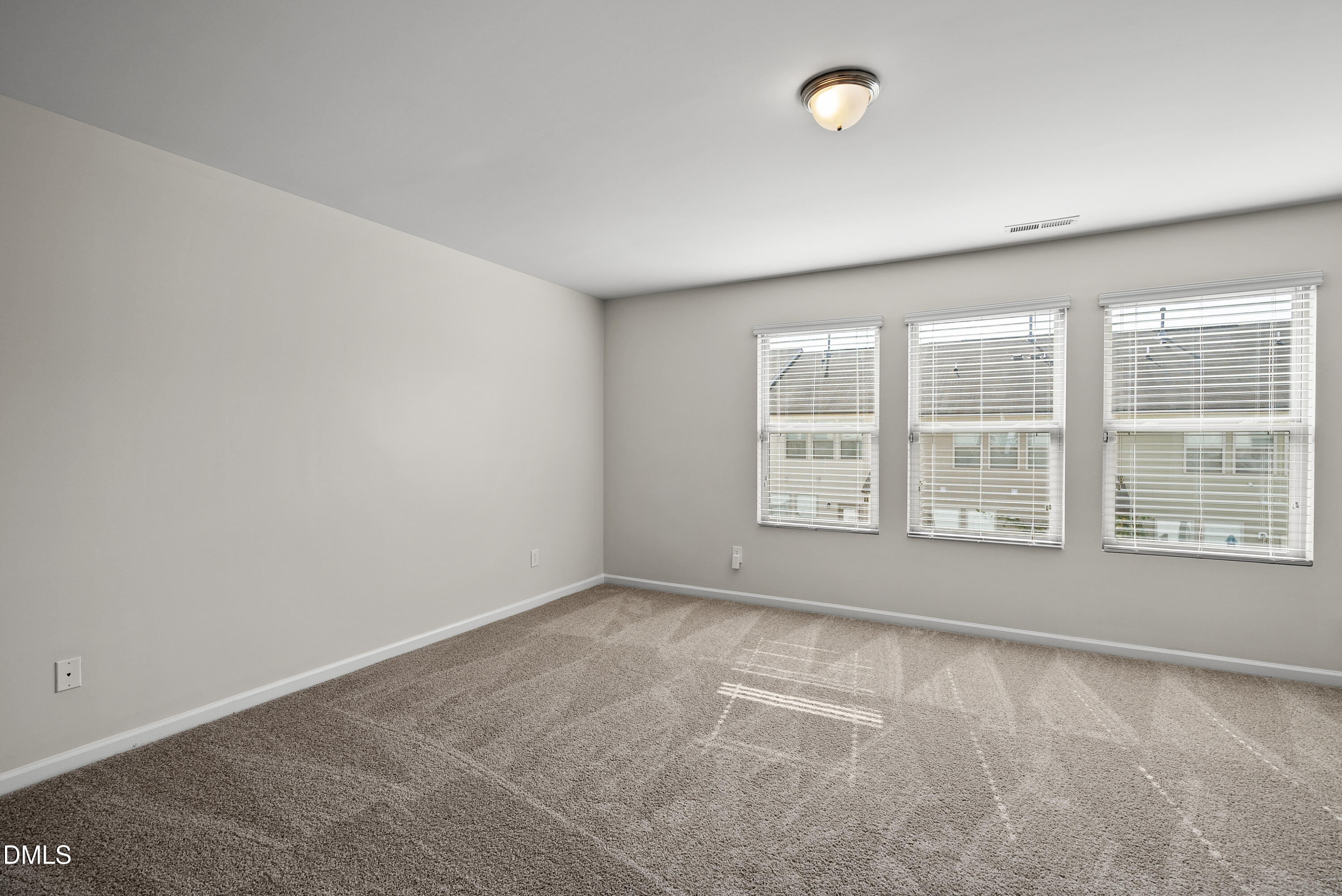 309 Leighann Ridge Lane Rolesville, NC 27571 - Photo 13 of 25 a view of an empty room with a window